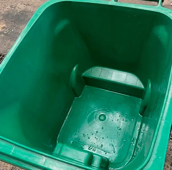 Deodorized commercial trash bin fully cleaned and sanitized after mobile wash